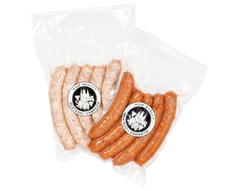 【ミート＆デリ かわきた屋】バジルソーセージ〈100gあたり〉350円、メルゲーズ〈100gあたり〉350円。