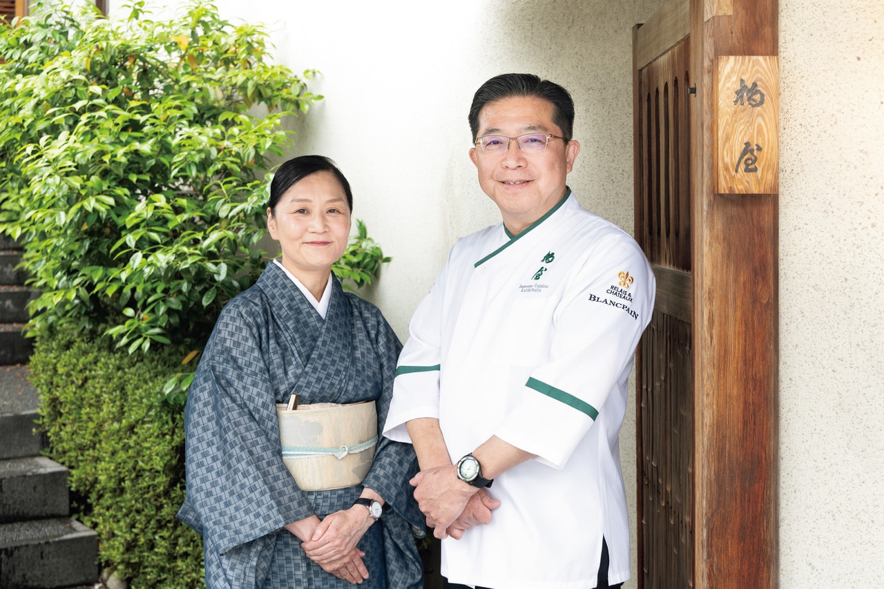 総料理長の松尾英明さんと女将の克子さん。
