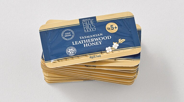 ブルーヒルズハニーの「タスマニアンレザー ウッドハニーTA5＋」4g×24枚 3,000円／たかくら新産業