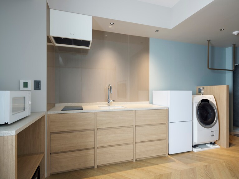 キッチン、ランドリーつきのOMOハウス。長期滞在向き。