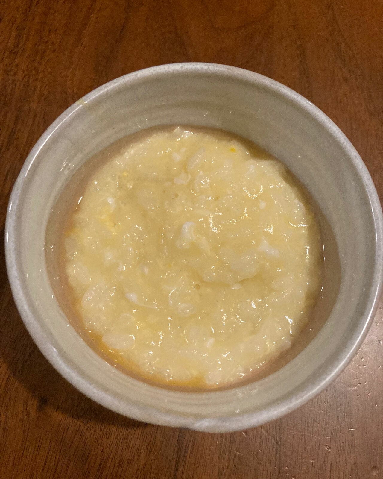 夕食の卵粥。この日の最後の食事となった。食べても食べてもお腹がすいた。