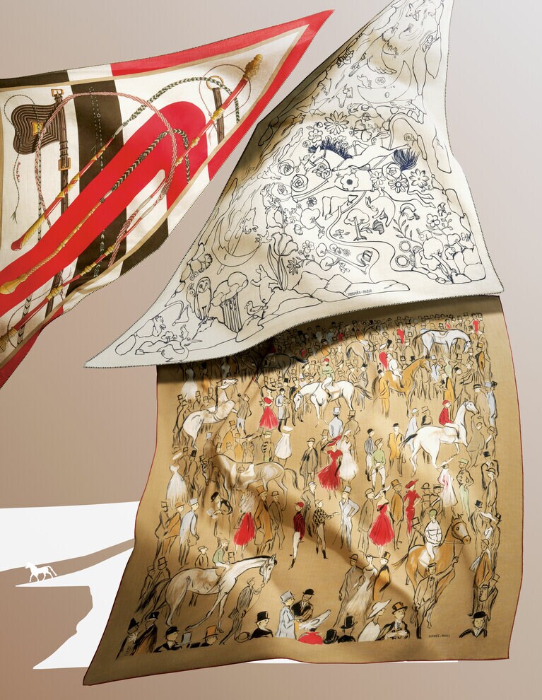 カシミヤ70％にシルク 30％をブレンドしたストールは、正方形の「カレジェアン」と三角形の「トライアングル ジェアン」が代表的。 
上・左：「トライアングル ジェアン」（208×99cm）『クリック・クラック』161,700円、上・右：「トライアングルジェアン」（208×99cm）『千と一のウサギ』161,700円、下：「カレジェアン」（140×140cm）『パドック』234,300円／エルメス（エルメスジャポン）