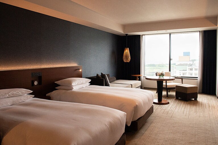 シーリー社のベッドを配した「クラブデラックスツイン」。