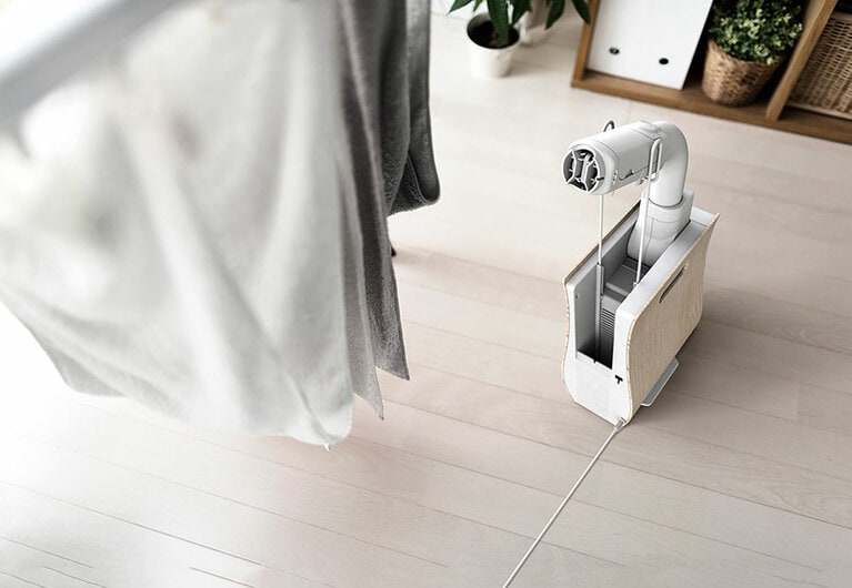 ズルをノズルハンガーにセットして温風を吹き出すと、衣類乾燥器に早変わりします。