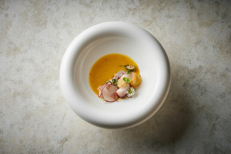 「北海道産水ダコのラクサ」。