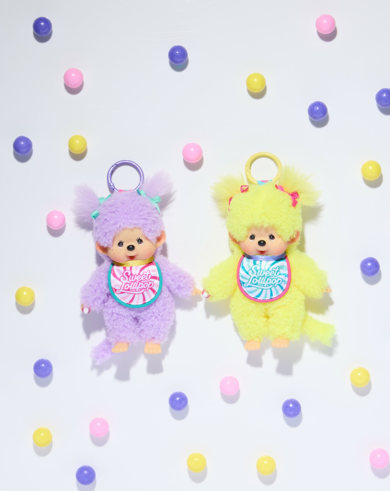 スウィートロリポップ モンチッチ キーチェーン（パープル／イエロー） 2,640円。©SEKIGUCHI