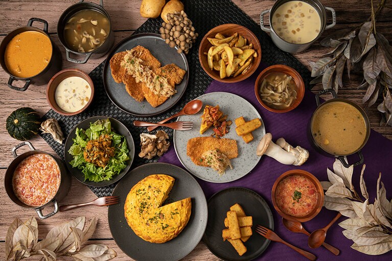 “郷土料理で世界旅行”をテーマにしたフードメニューのイメージ。