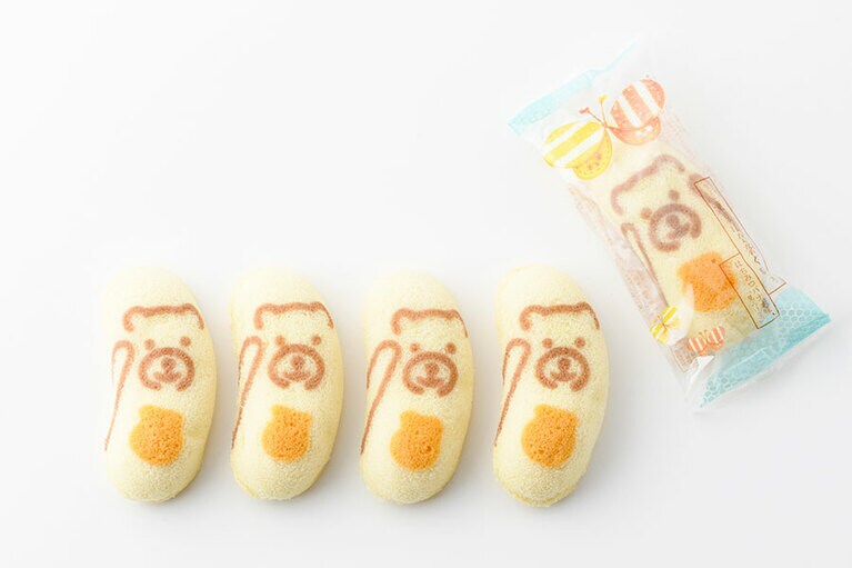 空とぶ東京ばな奈くまッス。はちみつバナナ味、「見ぃつけたっ」 1,080円(税込、8個入り)／東京ばな奈ワールド