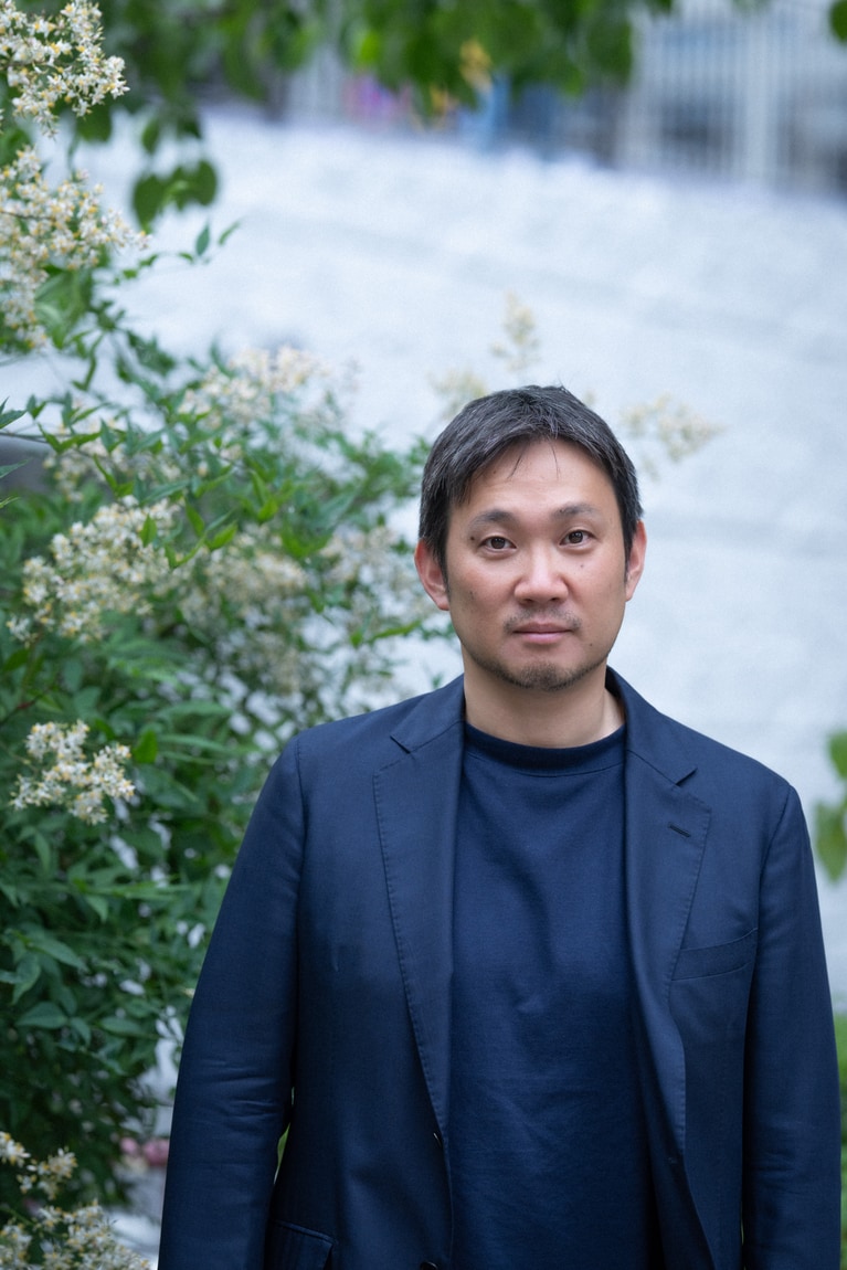 濱口竜介監督。