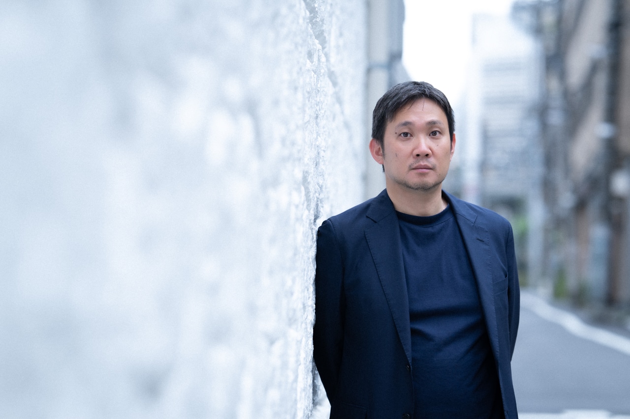 濱口竜介監督。