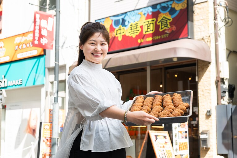 店主の劉惢さん。