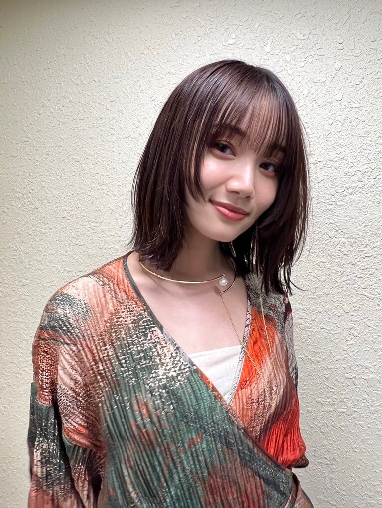 小顔効果も抜群なフェイスレイヤーボブ。