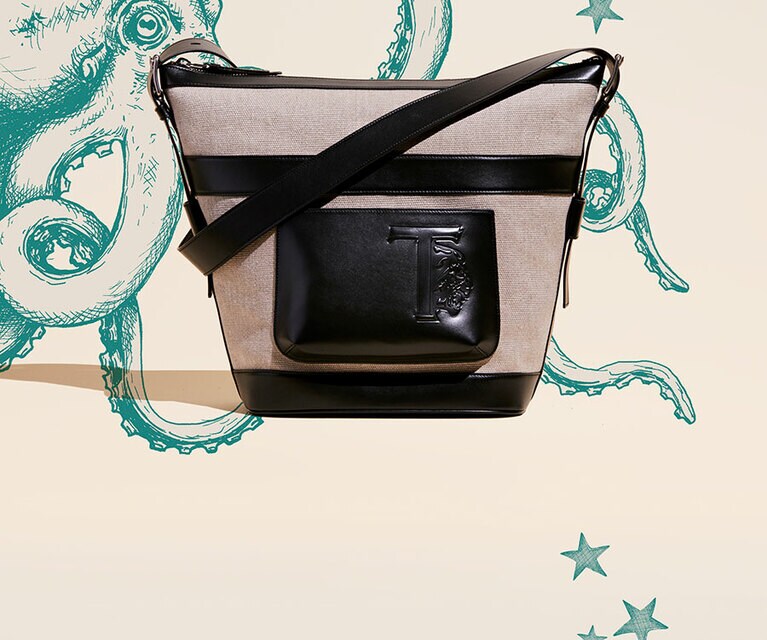 ファブリック＆レザー バケットバッグ ミディアム 185,900円。