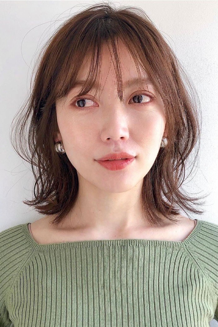 毛先が軽やかに弾む鎖骨ミディ。