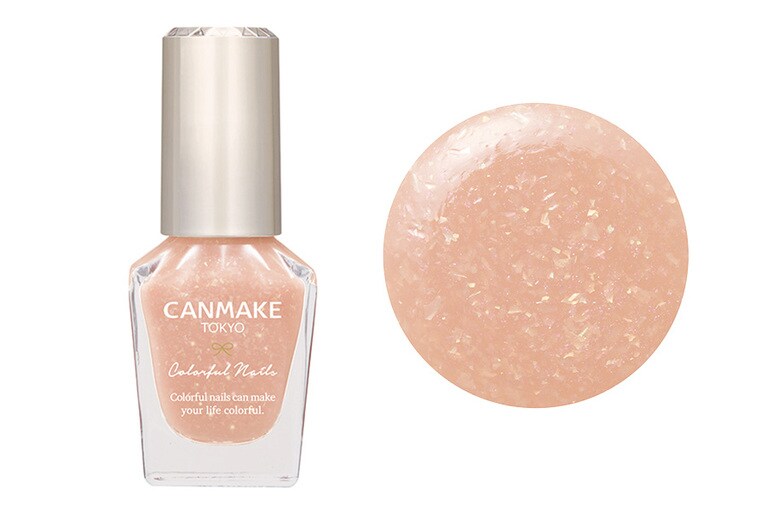 N111 アプリコットキャンディー。シアーオレンジにオーロラホログラムのラメが輝く、遊び心を感じるカラー。