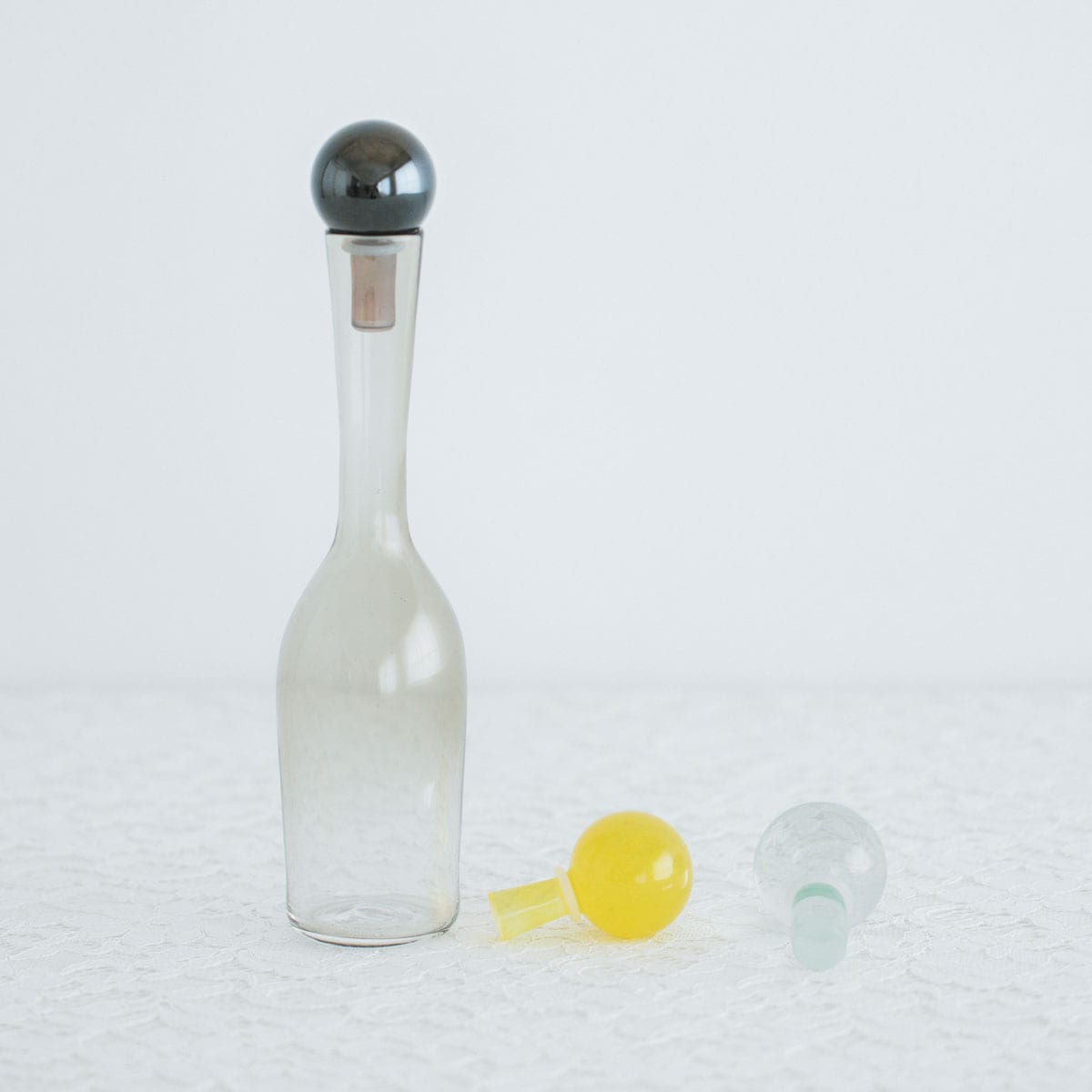 「Recycled Glass BOTTLE HEAD」各H約2.6×ヘッドφ約3.8×軸φ約1.6cm 左から：DEEP GREEN、YELLOW 各7,400円、CLEAR 6,800円／DEPT