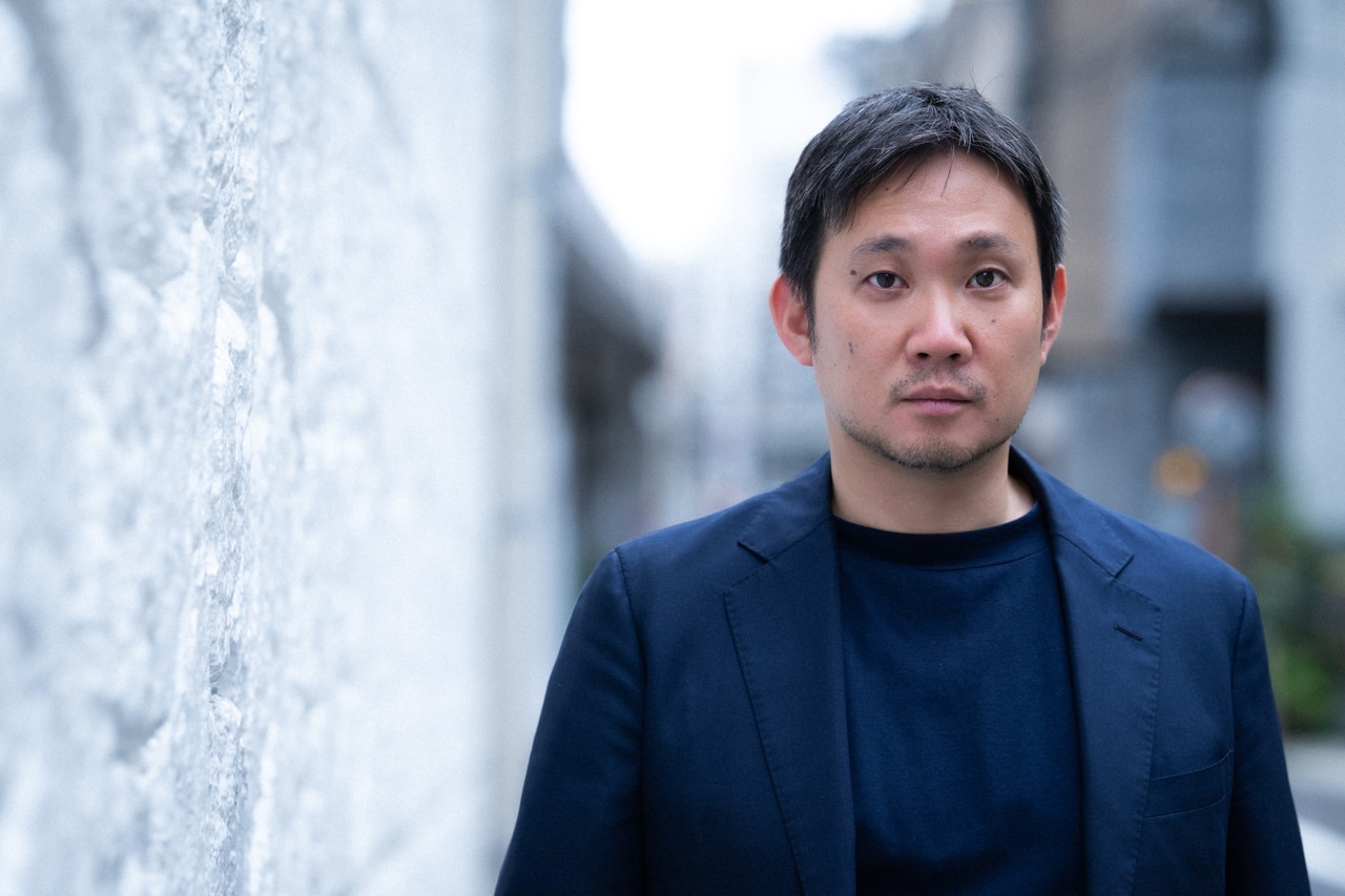 濱口竜介監督。