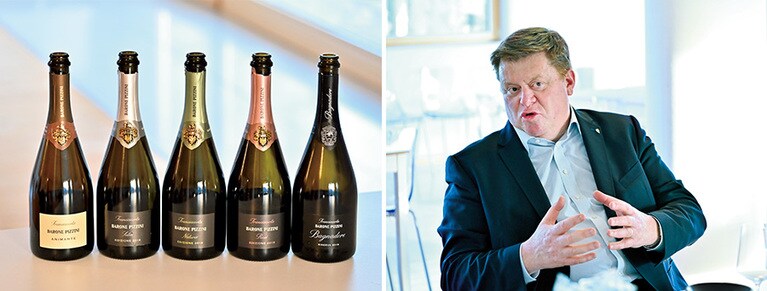 左：ラベルに家紋をあしらい、その歴史を告げるボトル。
右：オーナーのシルヴァーノ・プレシャニーニ氏。