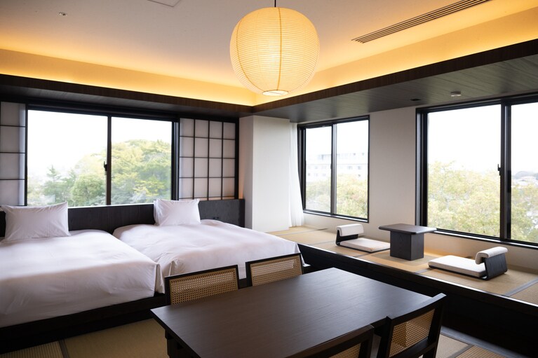 ベッドルームが2部屋ある「蜜柑」は、家族や友人とプライベート空間を保ちながら過ごせる。