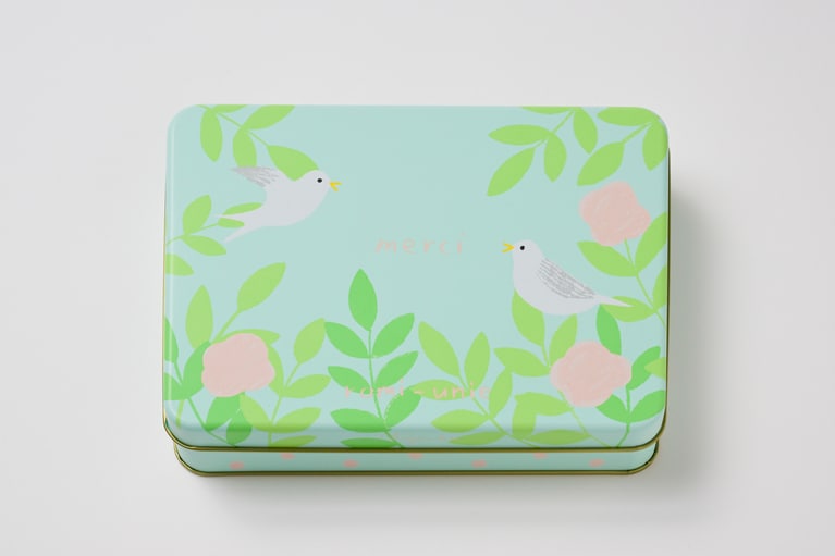 romi-unie／Merci Sable缶（石坂しづかさんデザインのサブレ缶）2,140円。