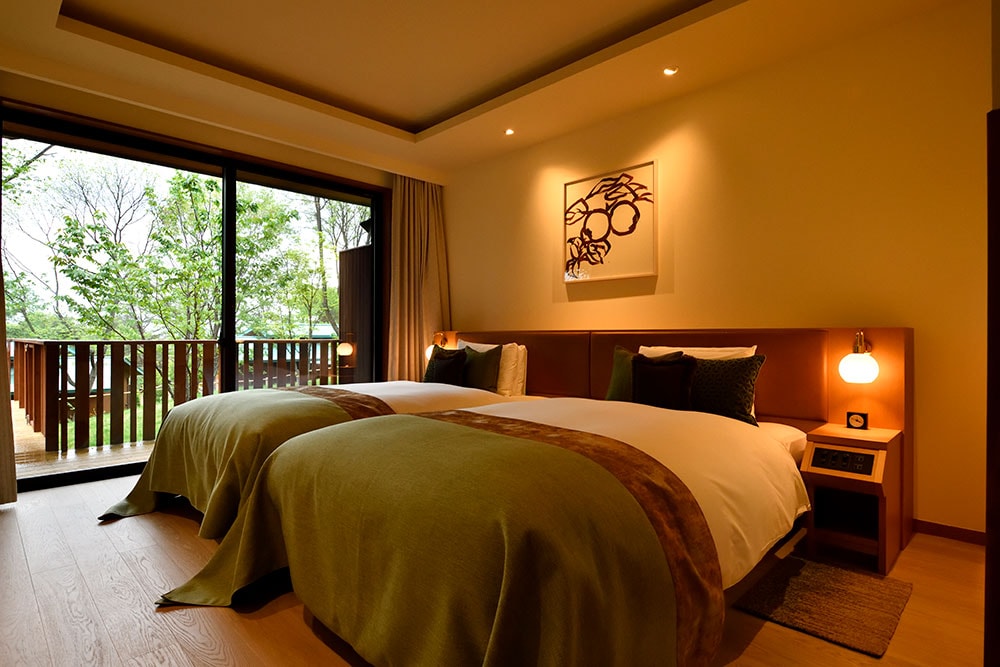 贅沢な空間を独占できる“ヴィラスイート”のベッドルーム。