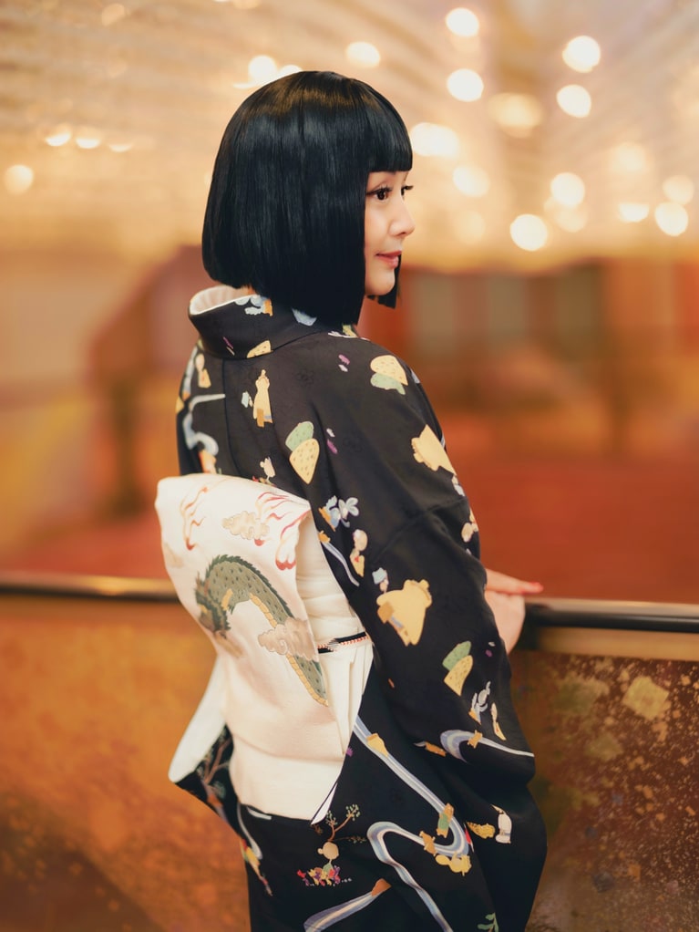 帯は躍動感がありながらもどこか愛らしい龍。