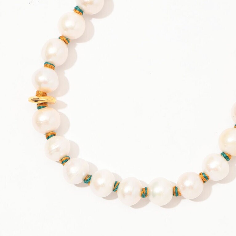PACIFICA PEARL NECKLACE 59,400円／LIZZIE FORTUNATO