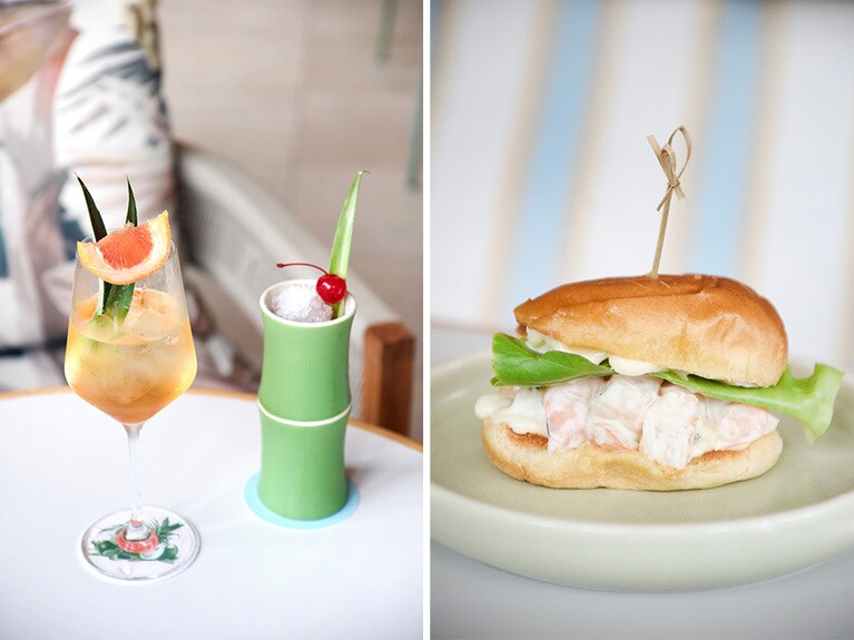 左：（左から）パイナップル風味のラムとデイビッドソンプラムリキュールを使ったカクテル“アイドル・ハンズ・スピリッツ”、ケアンズに近いマリーバで造られている熟成ラムとスイカジュースを合わせた“クラブスティンガー”各$22。右：名物の“カリプソロール”は季節の甲殻類のサンド。$18。