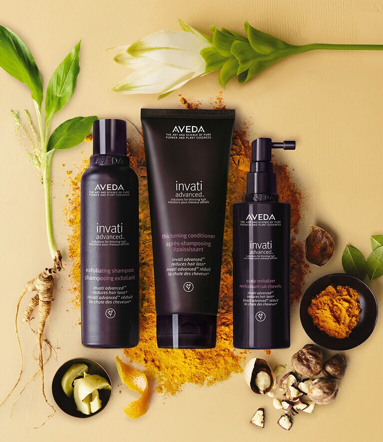 インヴァティ アドバンス。左から「インヴァティ アドバンス エクスフォリエイティング シャンプー」200g 3,300円／1,000g 12,375円、「インヴァティ アドバンス ヘアデンス コンディショナー」194g 3,700円／970g 13,875円、「インヴィティ アドヴァンス ヘア＆スカルプエッセンス」150mL 8,200円。