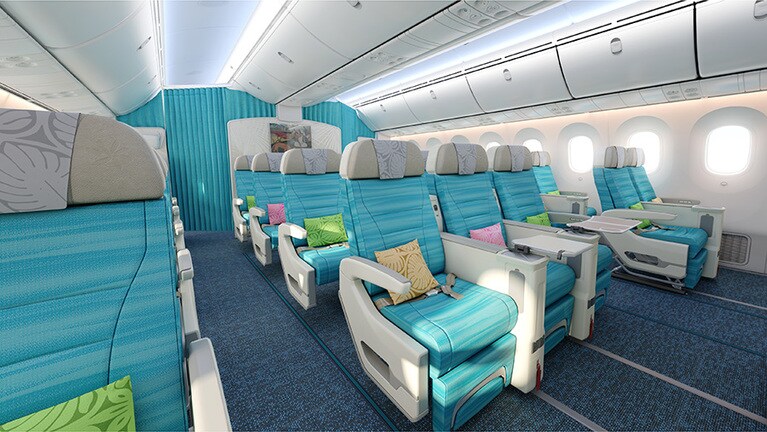 ラグーンのブルーに熱帯の花々のようなカラフルなピロー。