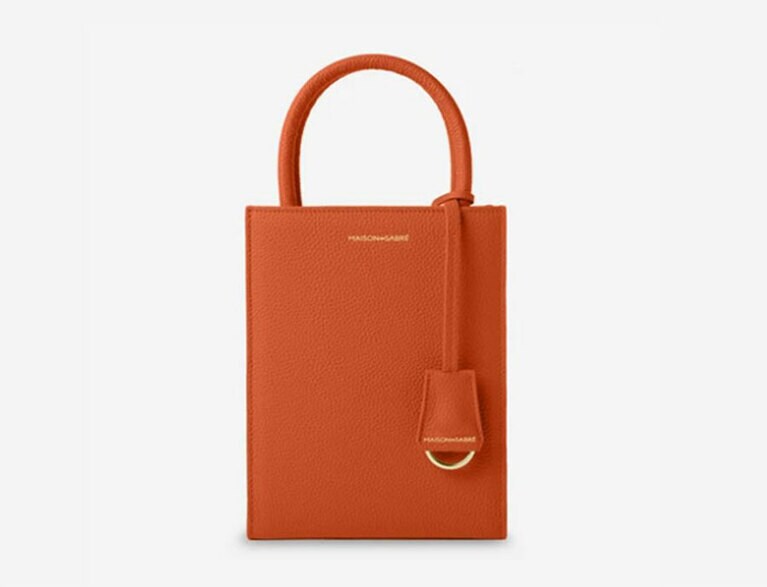 ミニトート マンンハッタンオレンジ 42,790円＜数量限定＞(W15.3cm×H約19cm×D5cm)。