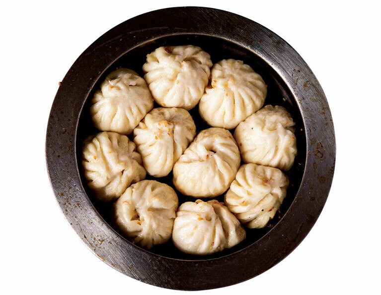 ［高記 永康店］上海鐵鍋生煎包 10個 220元。